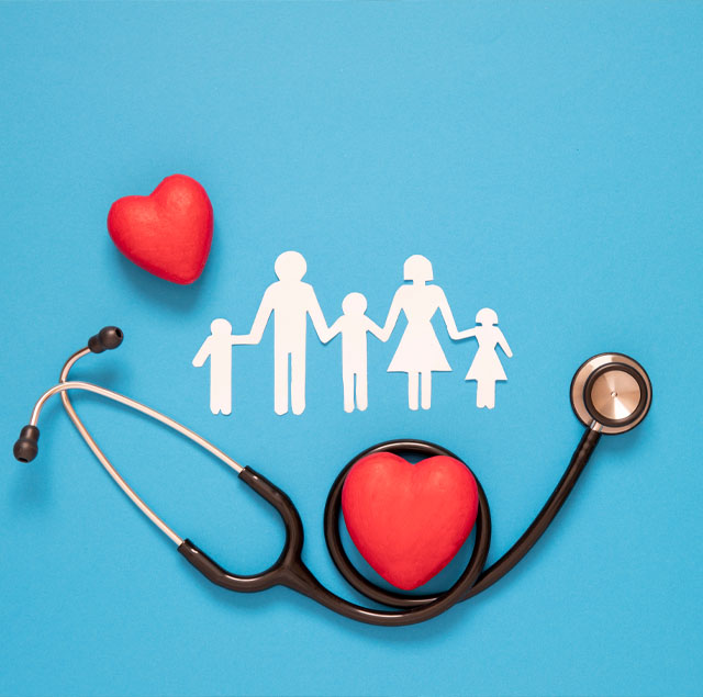 Image showing a paper family next to two red hearts and stethoscope
